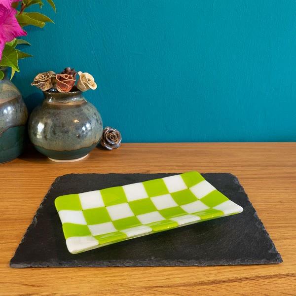 Handmade green and white checkered glass tray on slate, British craft decor