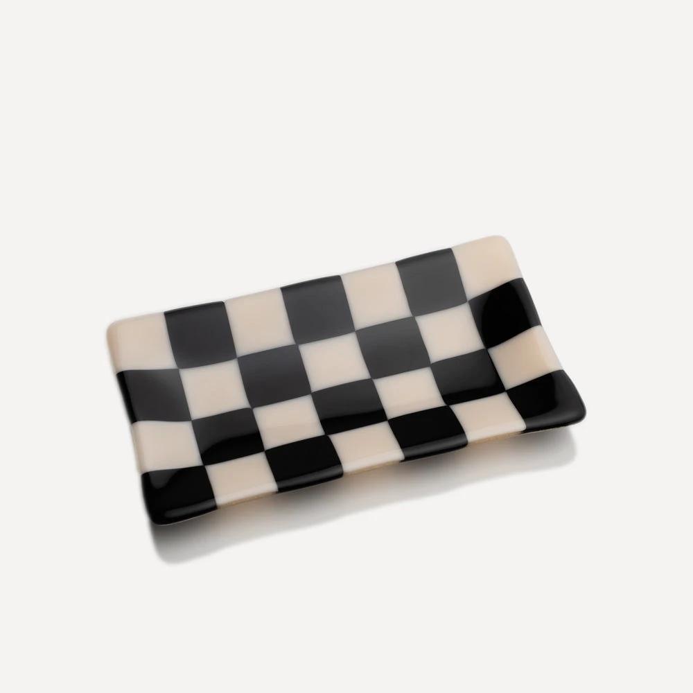 Black and white checkered ceramic dish, handmade British craft, modern geometric design