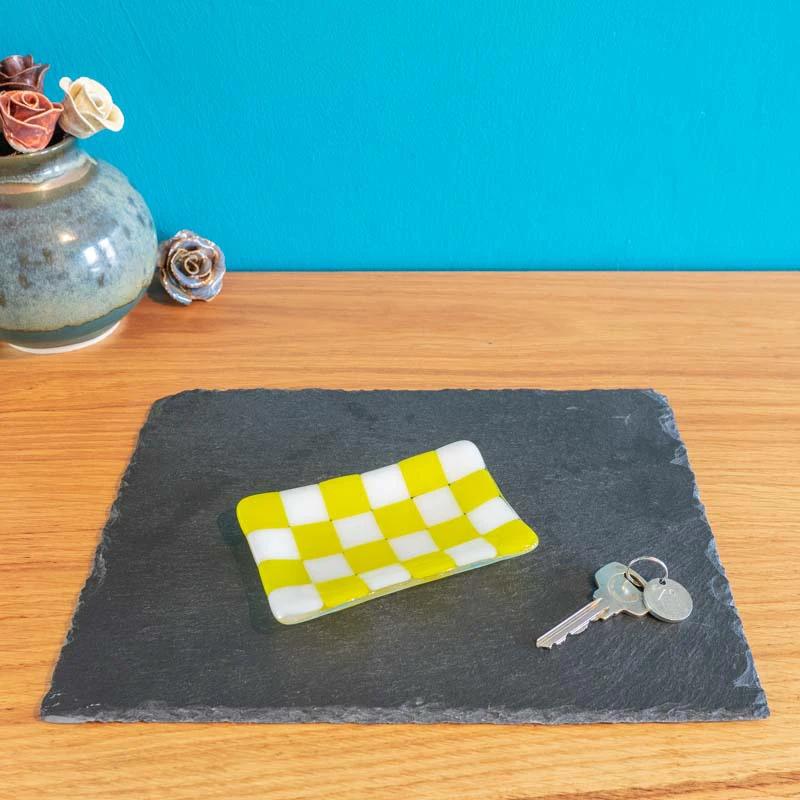 Yellow and white checkered fused glass dish on slate tray, keys beside, British handmade decor
