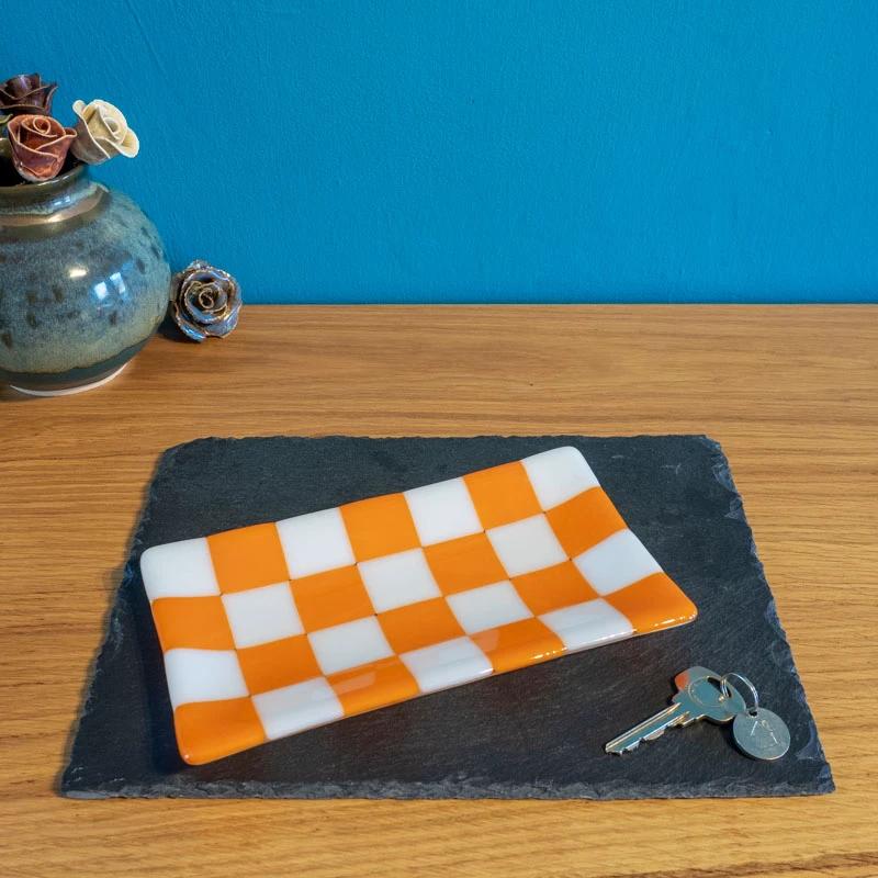 Orange and white checkered ceramic dish on slate tray, handmade British craft