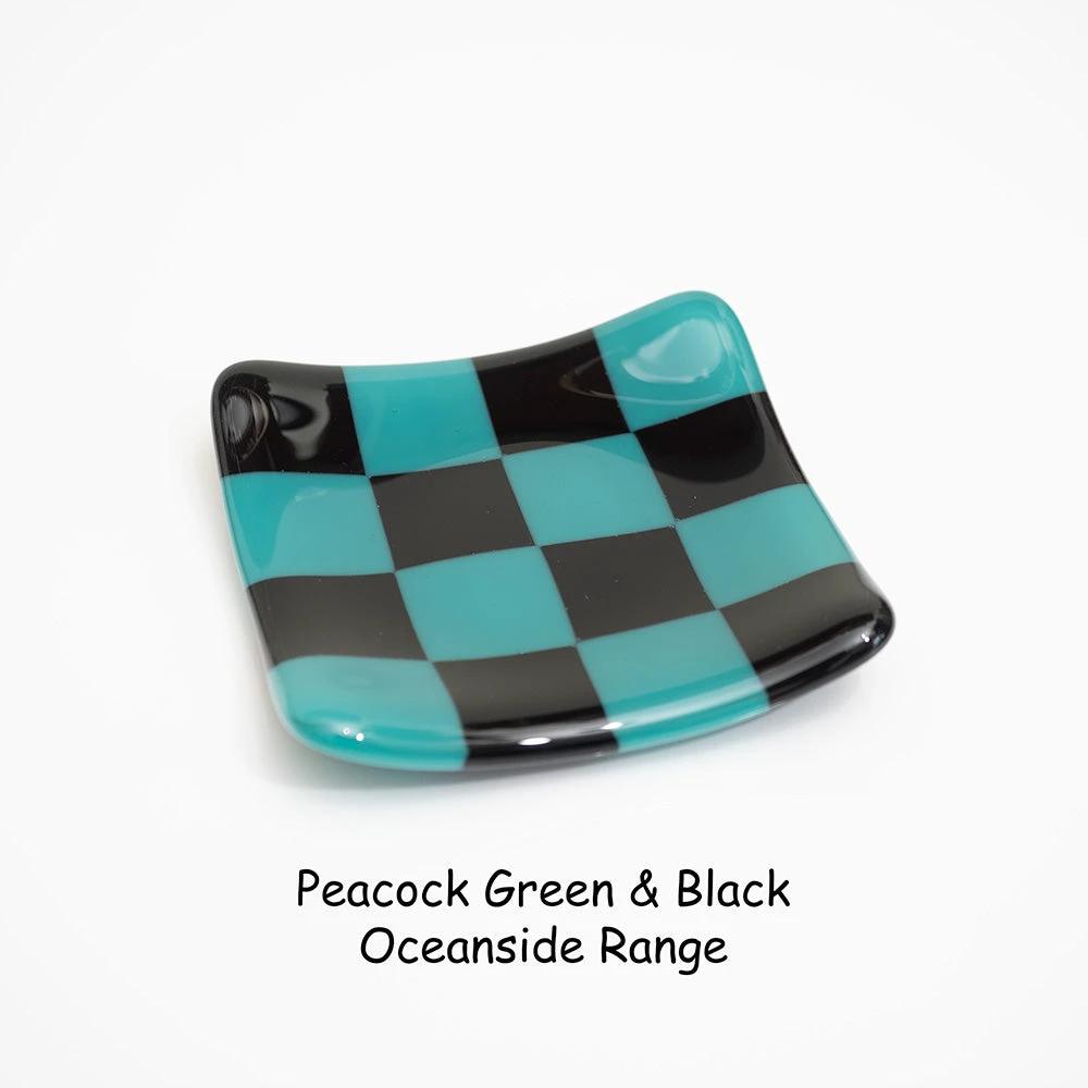 Peacock green and black checkered fused glass dish from Oceanside Range, handmade British craft