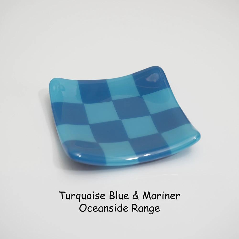 Turquoise and mariner blue checkered glass dish from Oceanside Range, handmade British craft