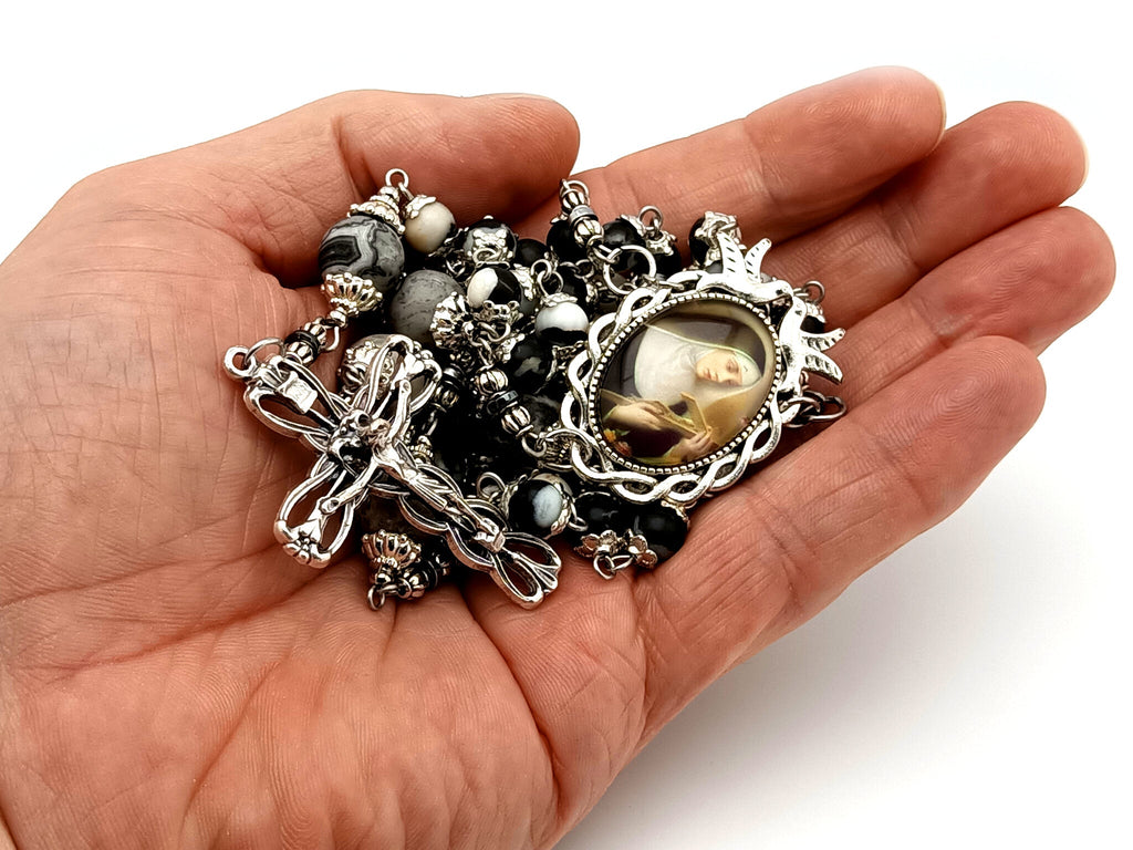 Saint Rita zebra and map jasper gemstone rosary beads with silver plated lily crucifix.