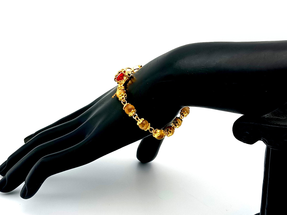 Sacred Heart tigers eye gemstone and crystal 18ct gold single decade rosary bead bracelet with Holy Spirit medal.