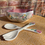 Floral salad bowl, with serving utensils