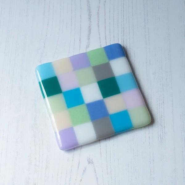 Handmade glass coaster with pastel checkerboard pattern, British craft, home decor