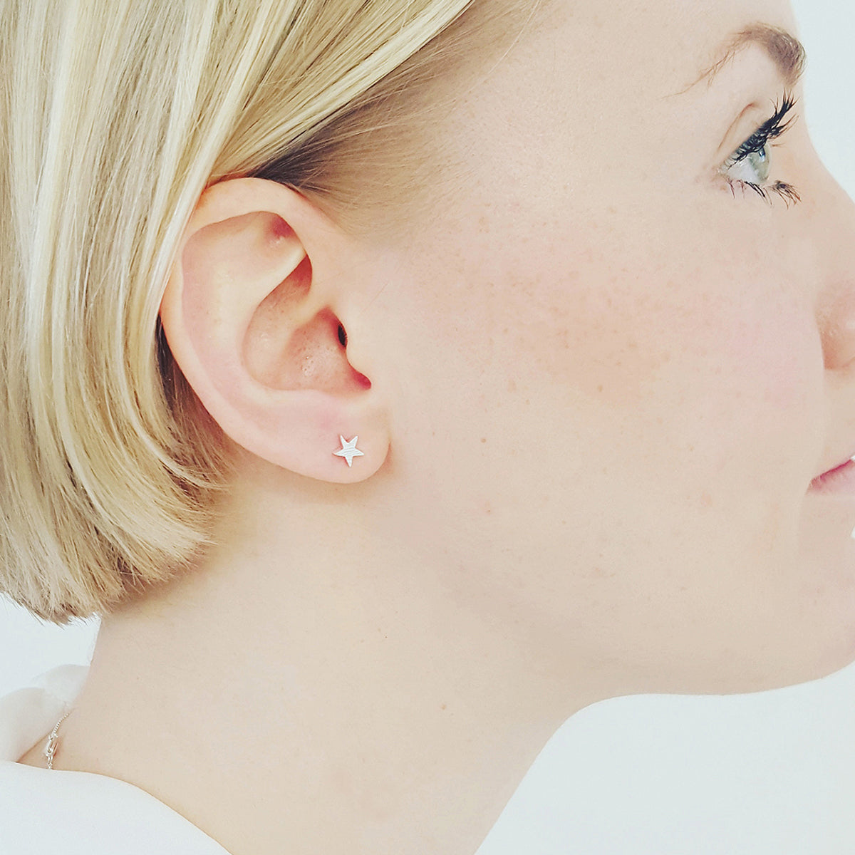 - Twilight Star Silver Stud Earrings