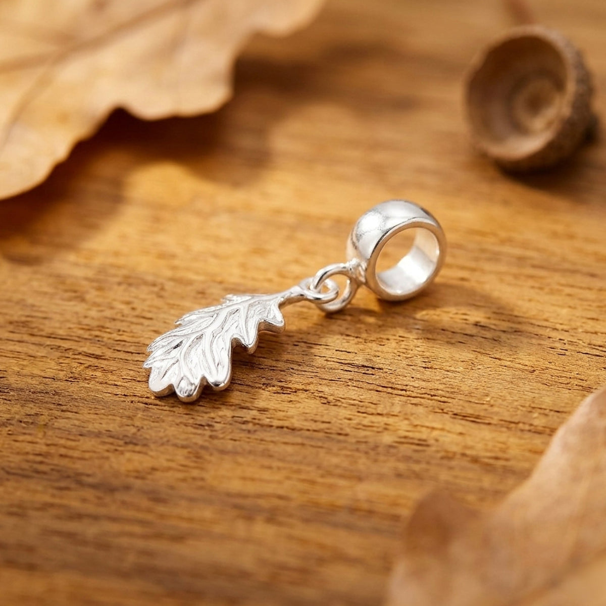 - Oak Leaf Silver Charm