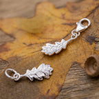 - Oak Leaf Silver Charm